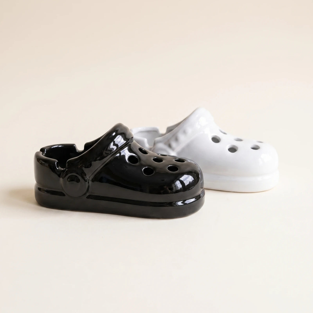 The Clogs — ceramic ashtray set: Slip and Stomp